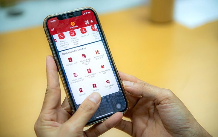 thue-17286080646251625515686-17327966464991218435835 Đặt mục tiêu 100% người nộp thuế sử dụng eTax Mobile - Ảnh 1.